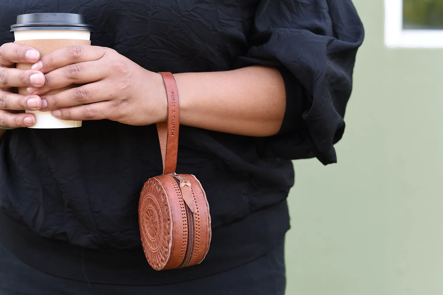 Embossed Circle Wristlet